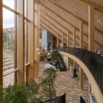 BIG Designs Dymak’s Circular Headquarters as a Living Showcase of Sustainable Materials