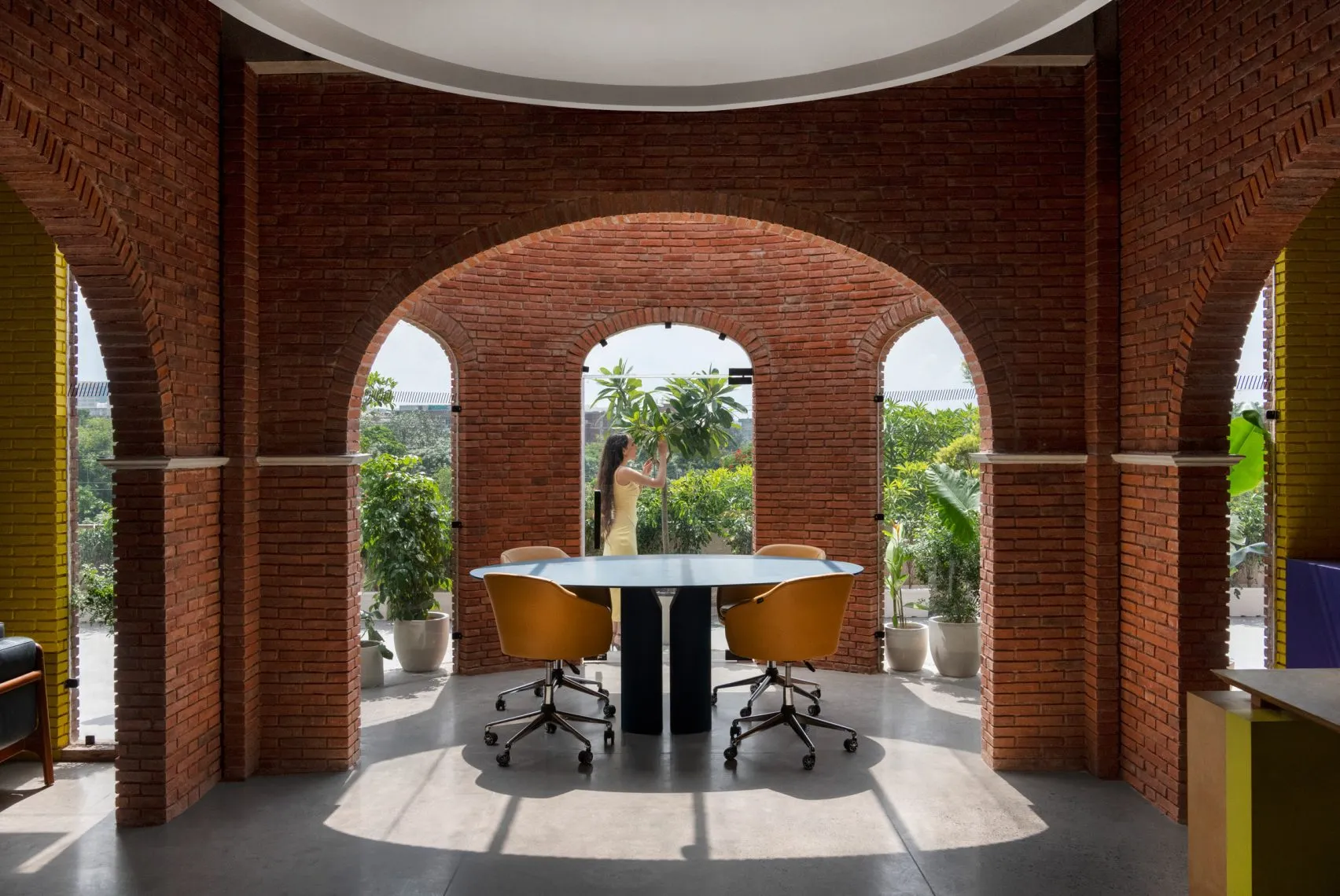 Logic Design + Build Reinvents an Office with Brick Arches and Mondrian-Inspired Interiors