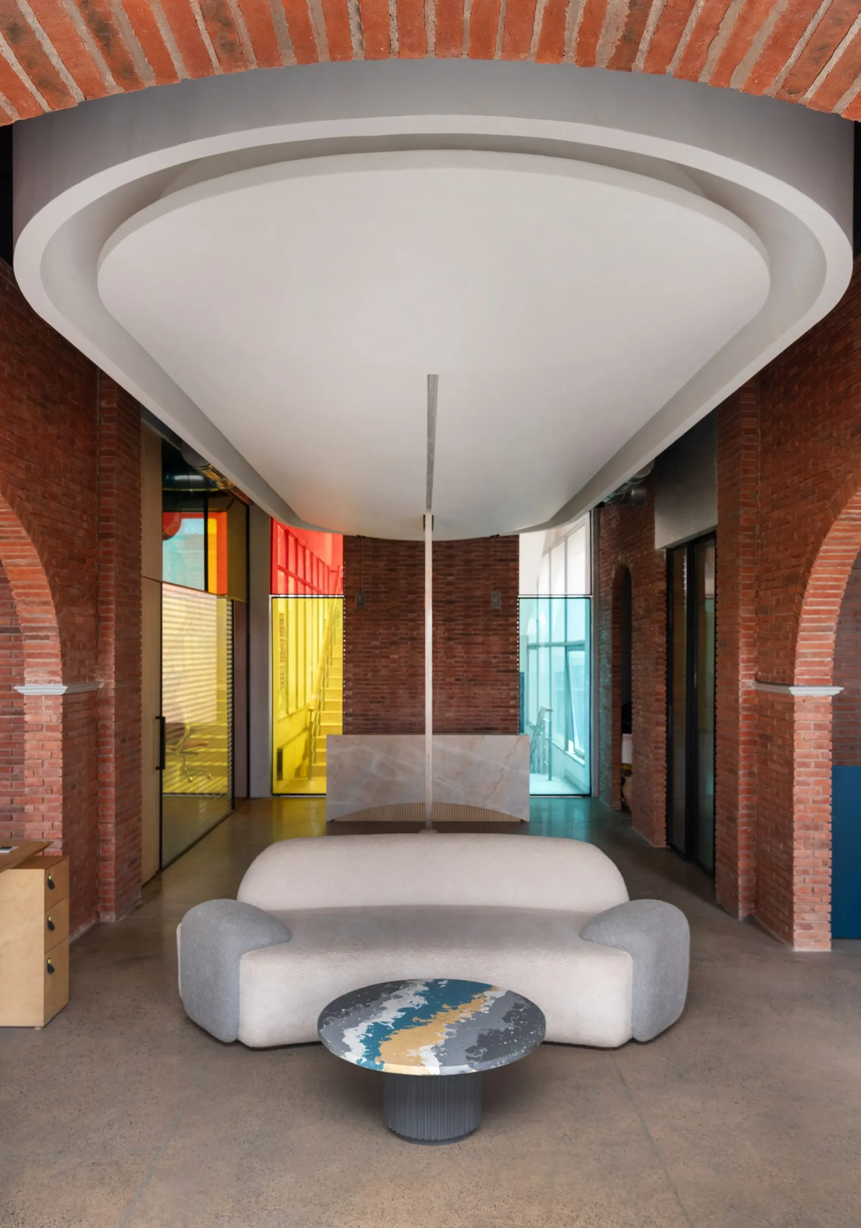 Logic Design + Build Reinvents an Office with Brick Arches and Mondrian-Inspired Interiors