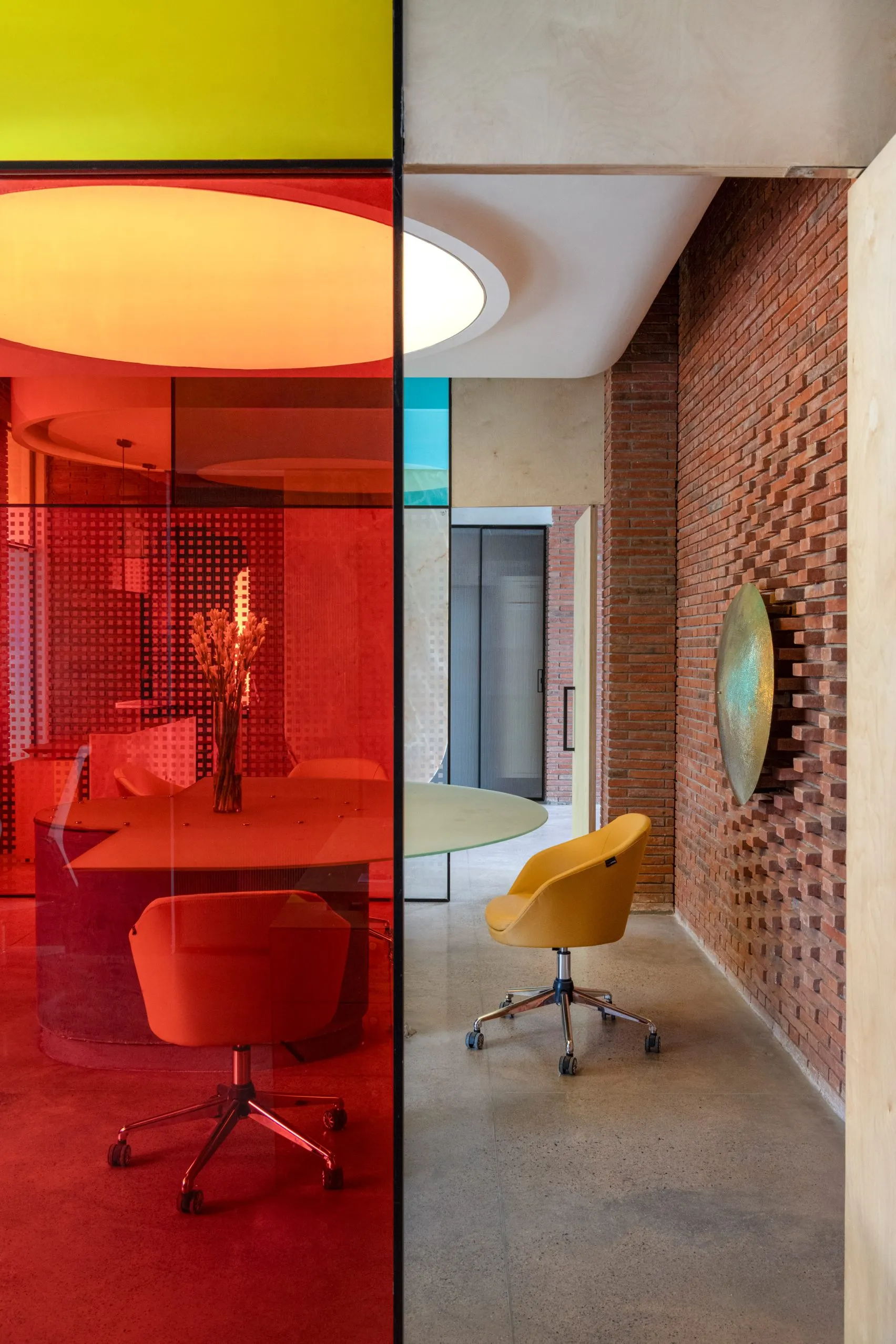 Logic Design + Build Reinvents an Office with Brick Arches and Mondrian-Inspired Interiors