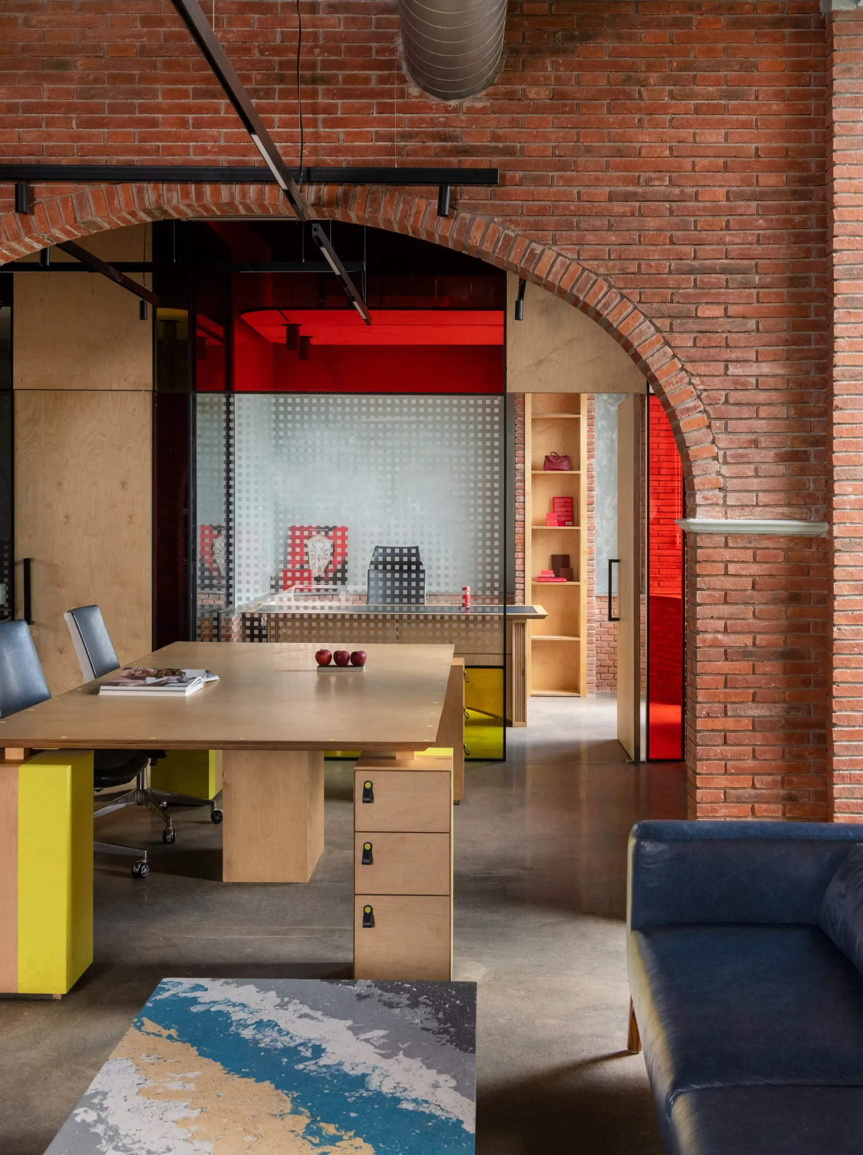 Logic Design + Build Reinvents an Office with Brick Arches and Mondrian-Inspired Interiors